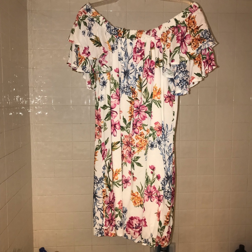 Off the shoulder mid-length dress.